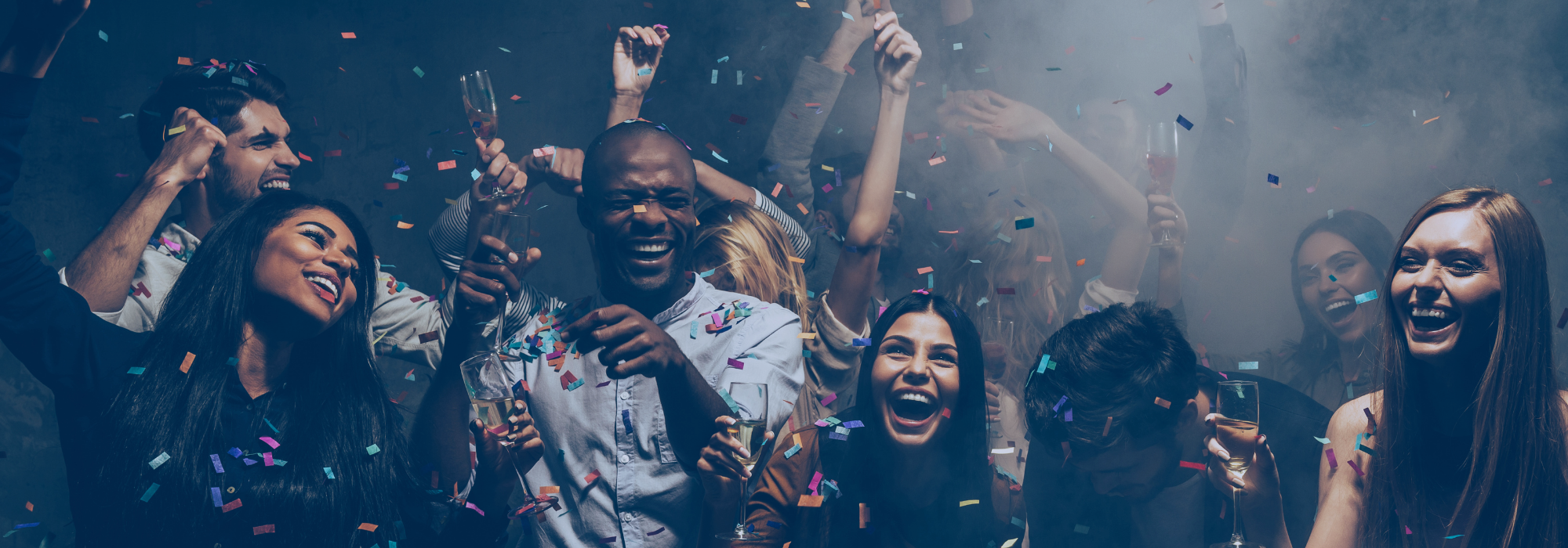 people laughing and dancing at a party 